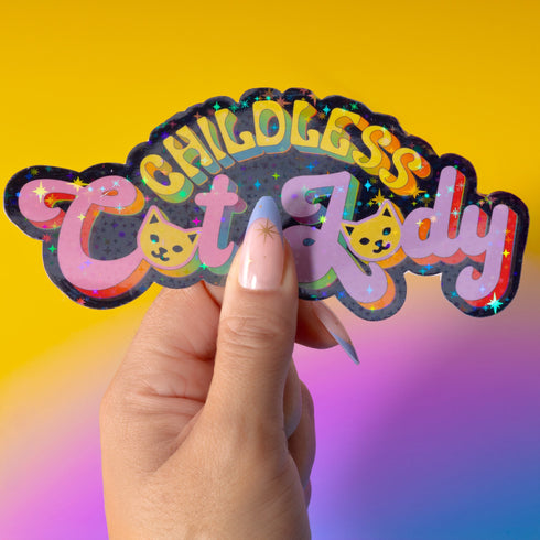 Bold "Childless Cat Lady" sticker with sassy typography and cat silhouettes, embodying feminist political pride.